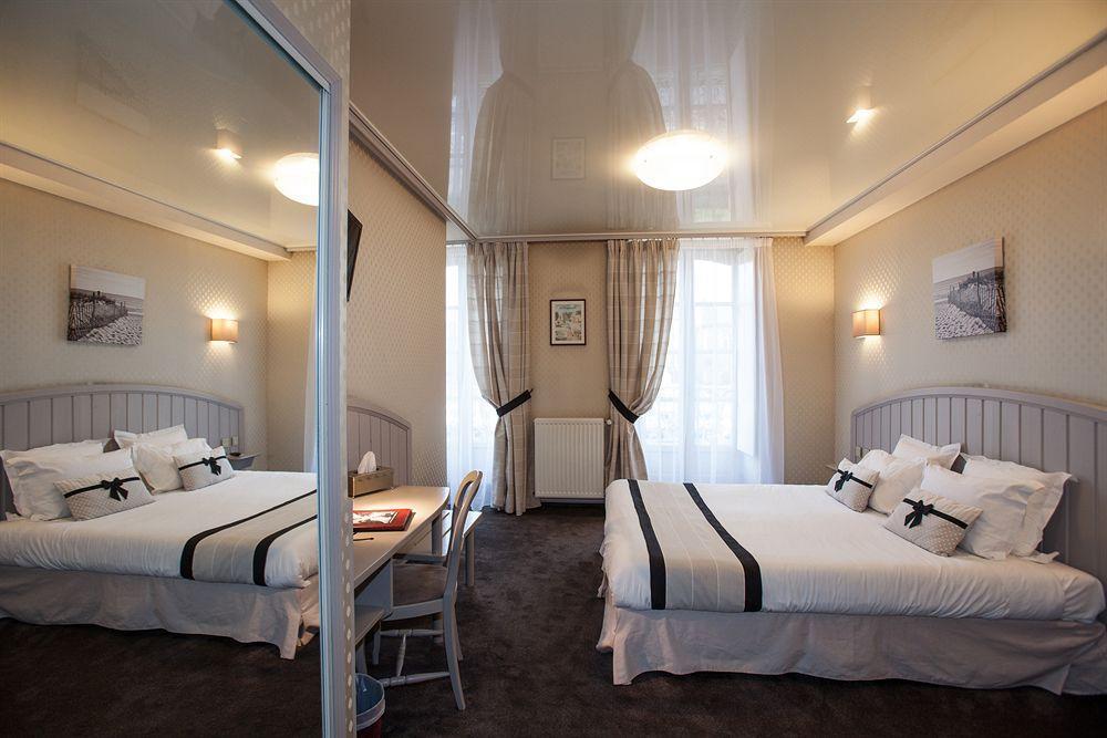דינאן Cit'Hotel Le Challonge מראה חיצוני תמונה
